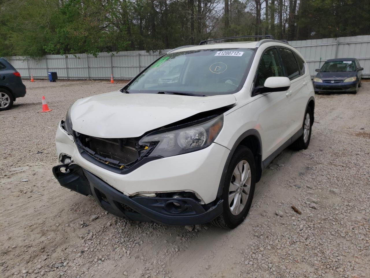 Photo 2 from auction – 2012 HONDA CR-V EXL with VIN 5J6RM4H74CL065970