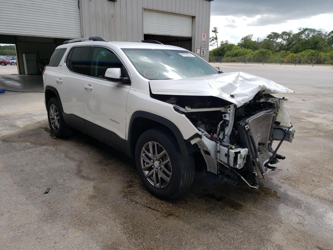 GMC ACADIA SLT 2018 with VIN 1GKKNMLS3JZ101663 - Photo from auction