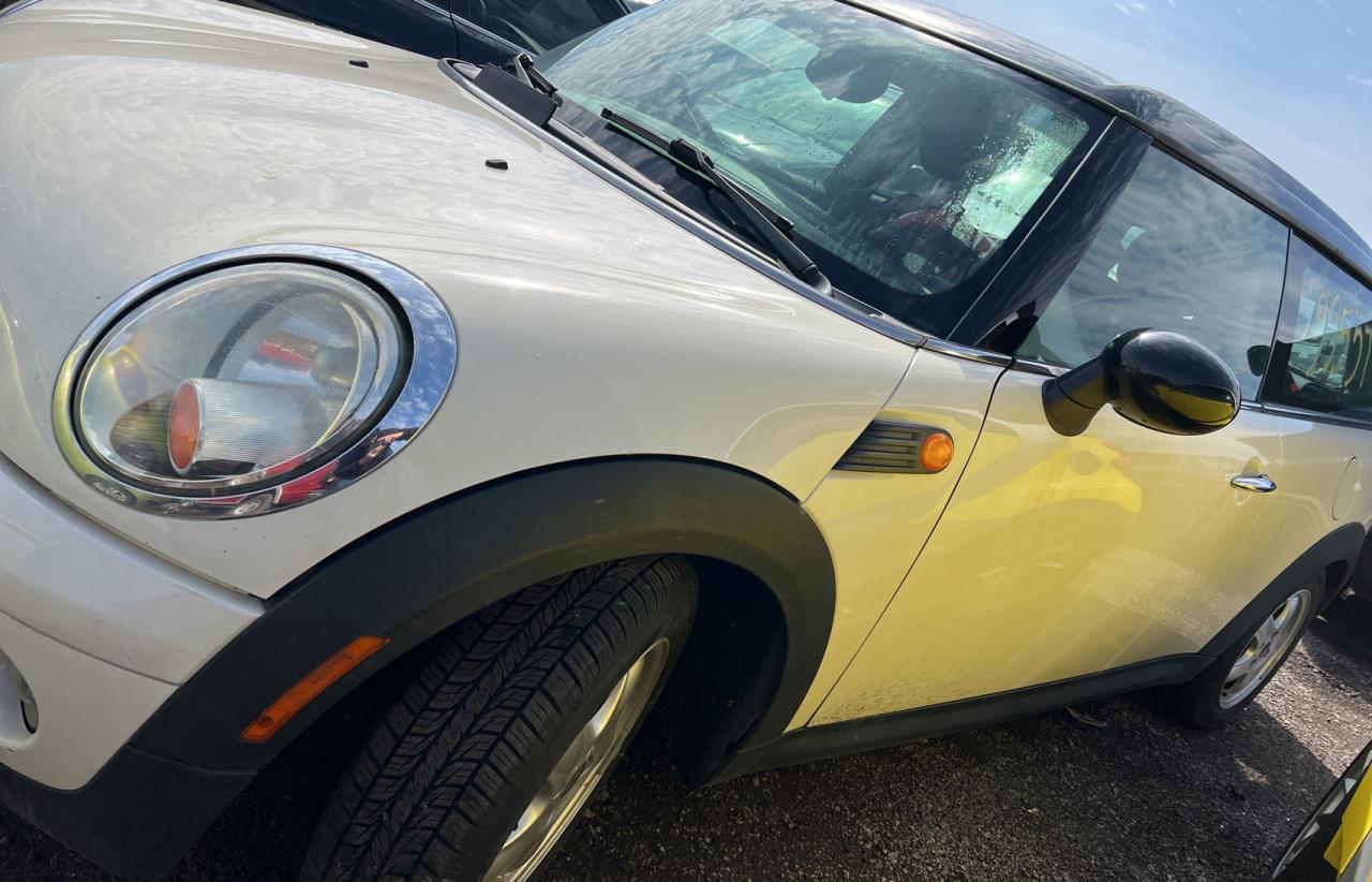 Photo 2 from auction – 2009 MINI COOPER CLU with VIN WMWML33519TX50338