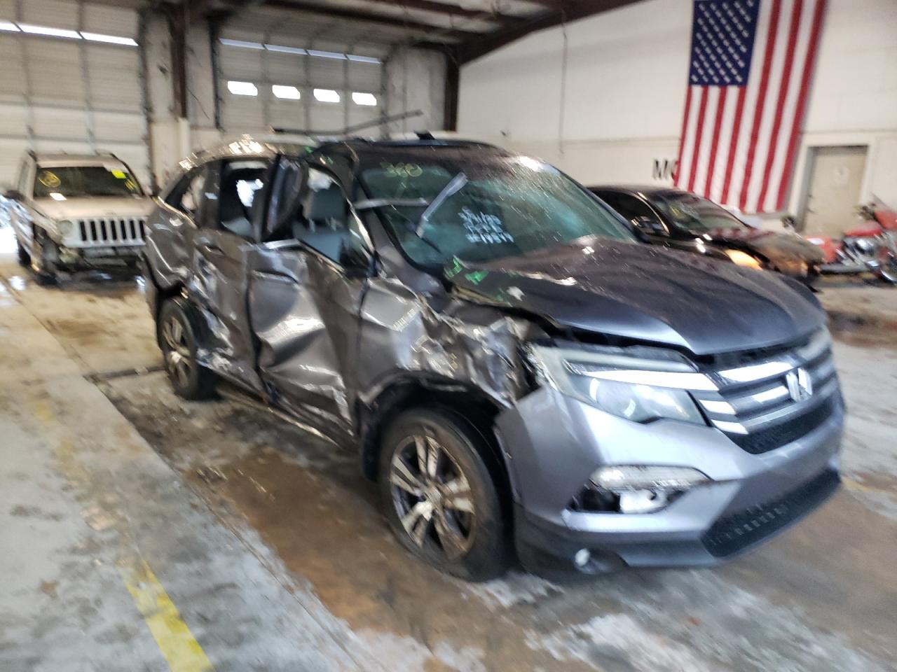 Photo 9 from auction – 2016 HONDA PILOT EXL with VIN 5FNYF5H52GB017389