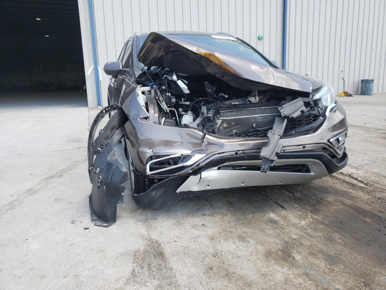 Photo 9 from auction – 2015 HONDA CR-V EXL with VIN 2HKRM3H76FH510928