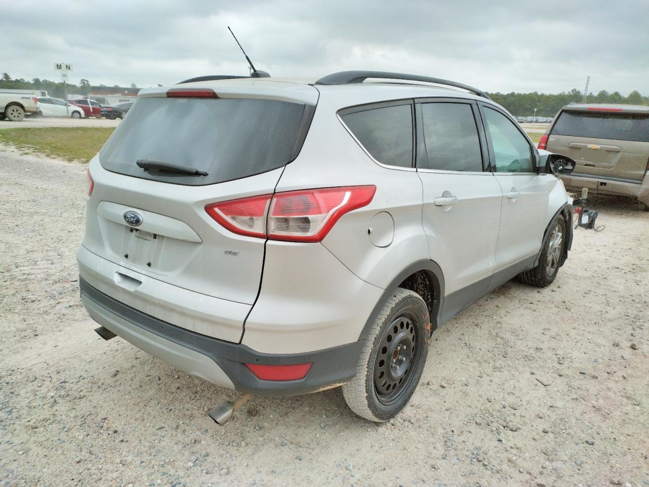 Photo 4 from auction – 2014 FORD ESCAPE SE with VIN 1FMCU0G92EUE51772