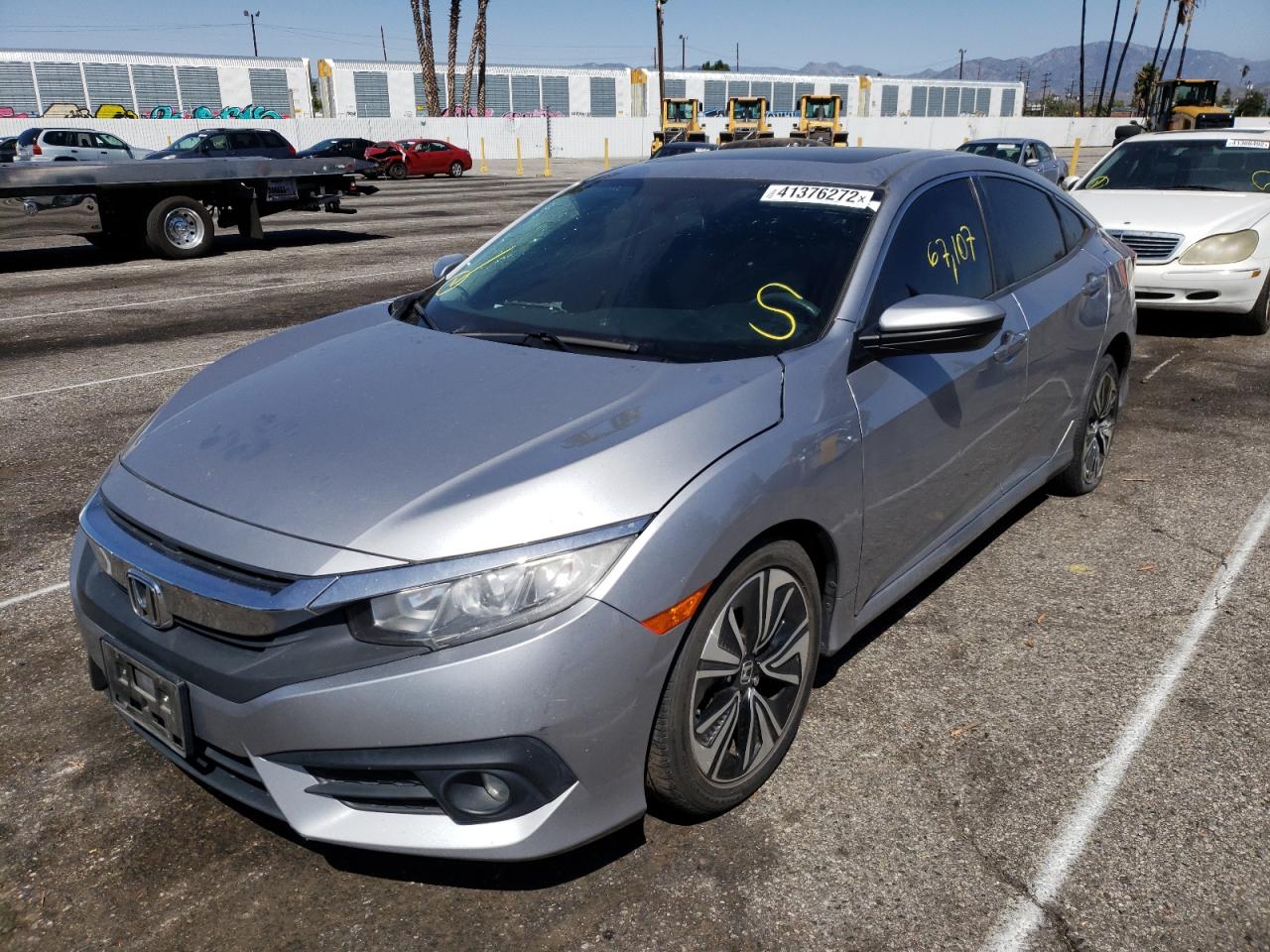 Photo 2 from auction – 2017 HONDA CIVIC EX with VIN 2HGFC1F37HH638845