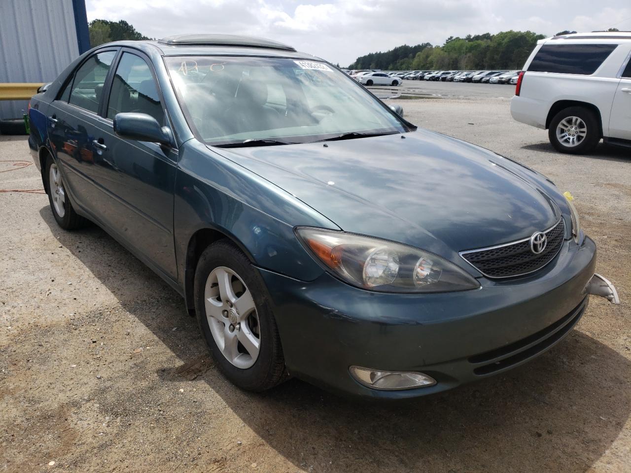 TOYOTA CAMRY LE 2002 with VIN 4T1BF30K02U503089 - Photo from auction