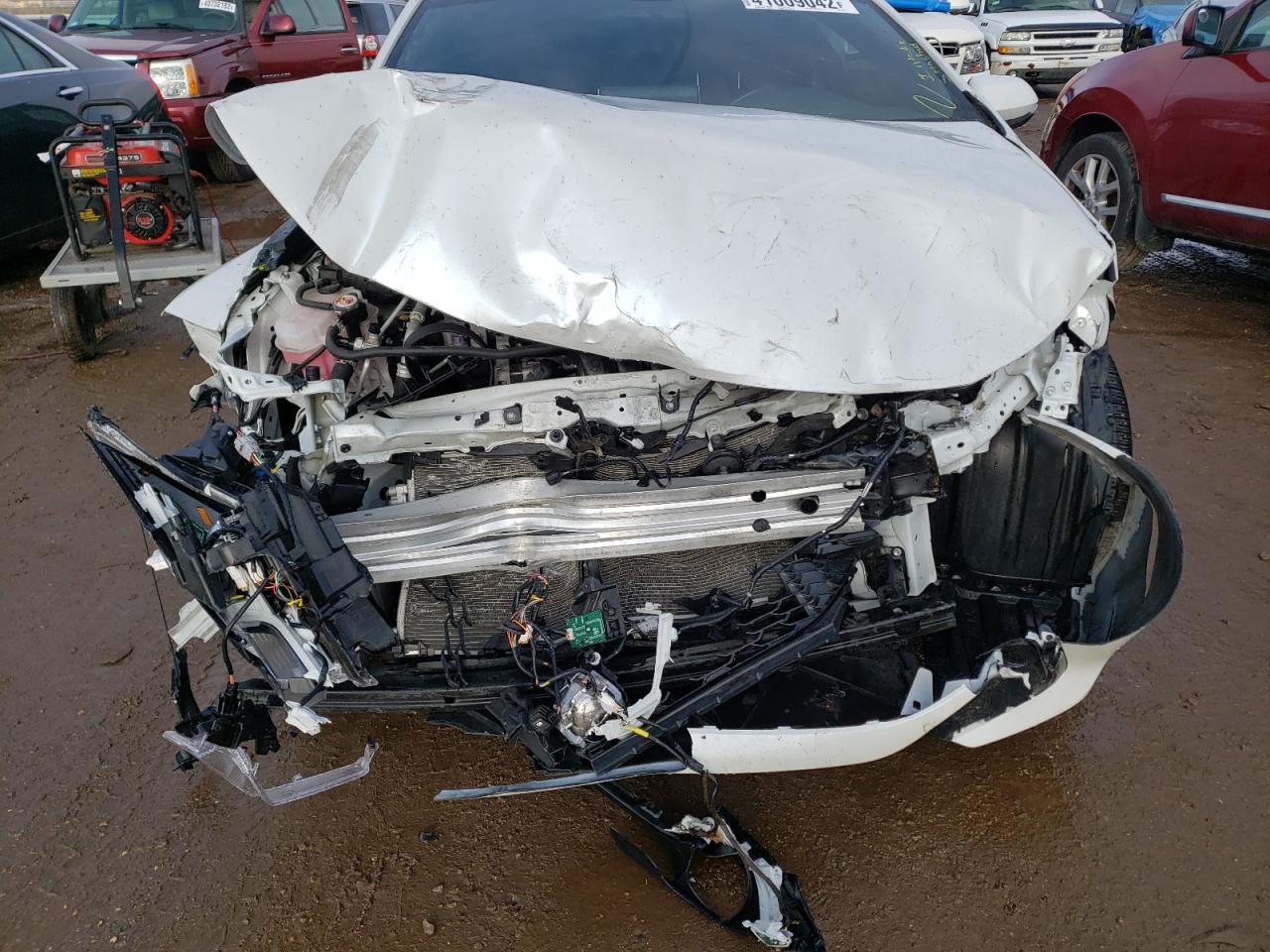 Photo 9 from auction – 2021 TOYOTA COROLLA SE with VIN JTNB4MBE4M3110417