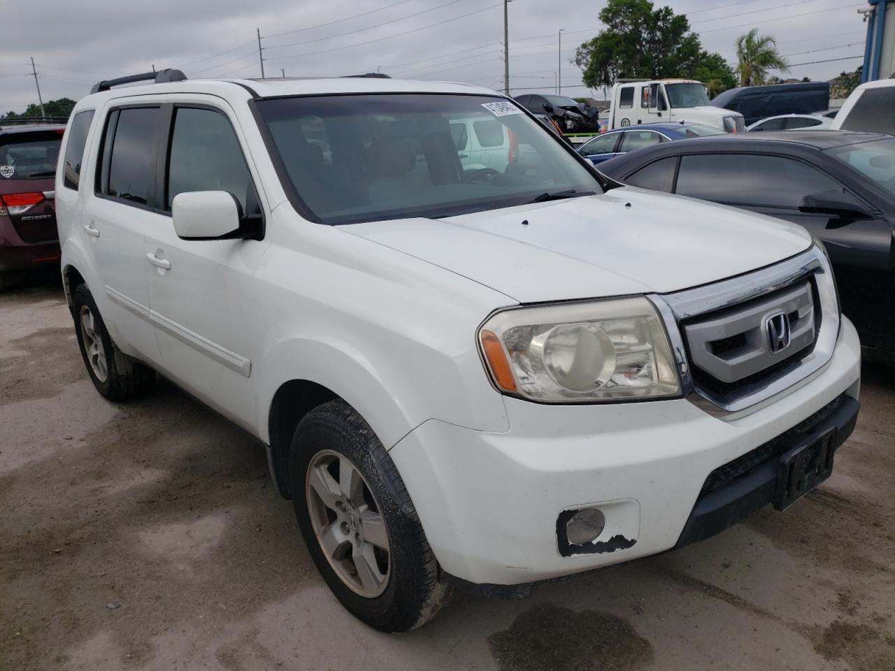HONDA PILOT EXL 2010 with VIN 5FNYF4H58AB012988 - Photo from auction