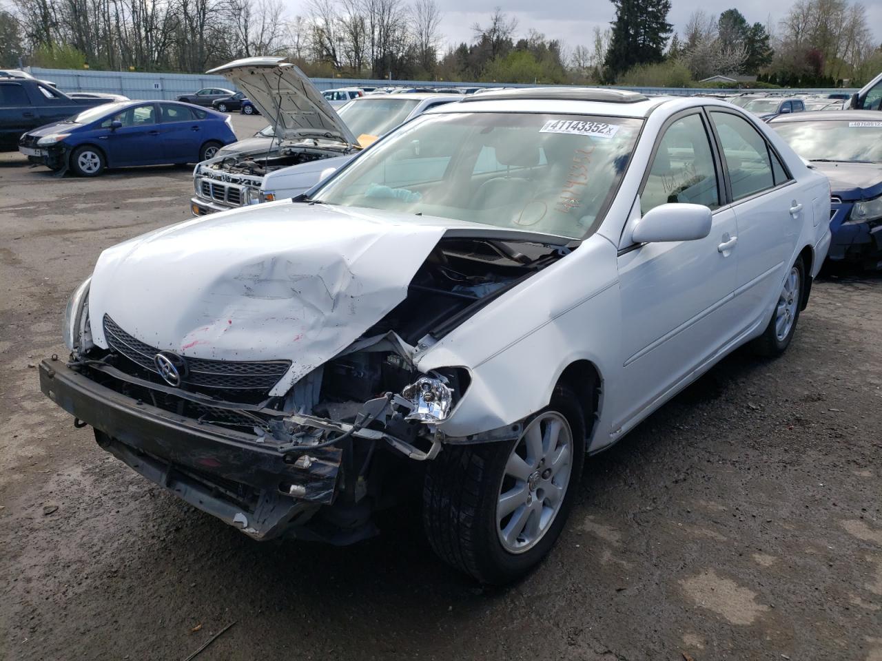 Photo 2 from auction – 2003 TOYOTA CAMRY LE with VIN 4T1BF30K63U048606