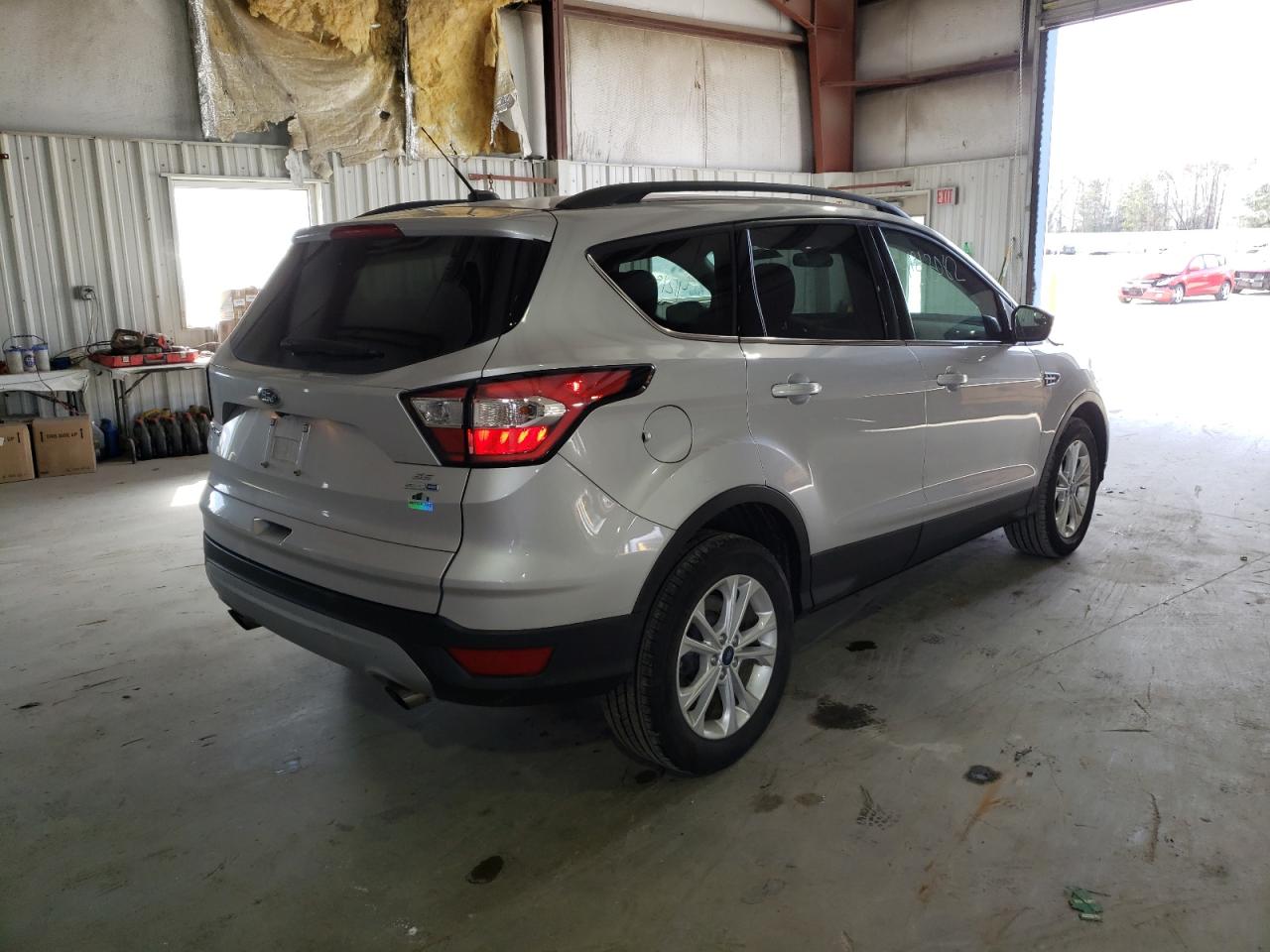 Photo 4 from auction – 2018 FORD ESCAPE SE with VIN 1FMCU9GD2JUB00962