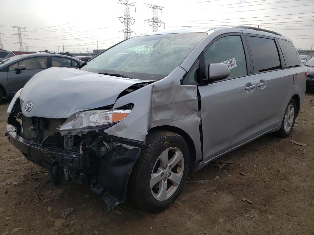 Photo 2 from auction – 2015 TOYOTA SIENNA LE with VIN 5TDKK3DC9FS625057