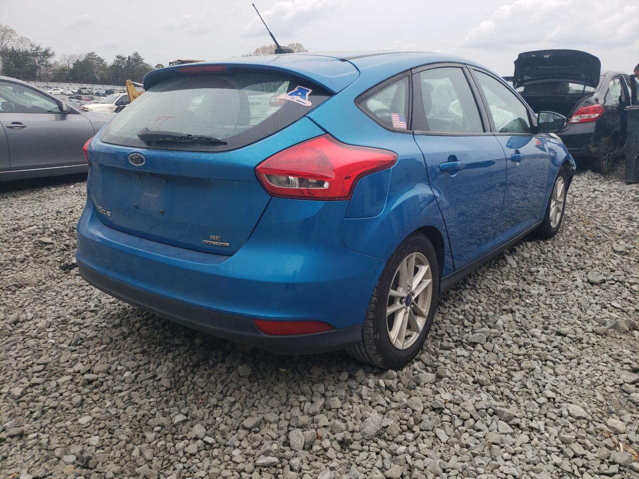 Photo 4 from auction – 2016 FORD FOCUS SE with VIN 1FADP3K21GL284010