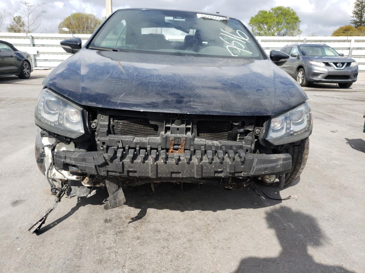 Photo 9 from auction – 2013 VOLKSWAGEN EOS LUX with VIN WVWFW8AH7DV007516