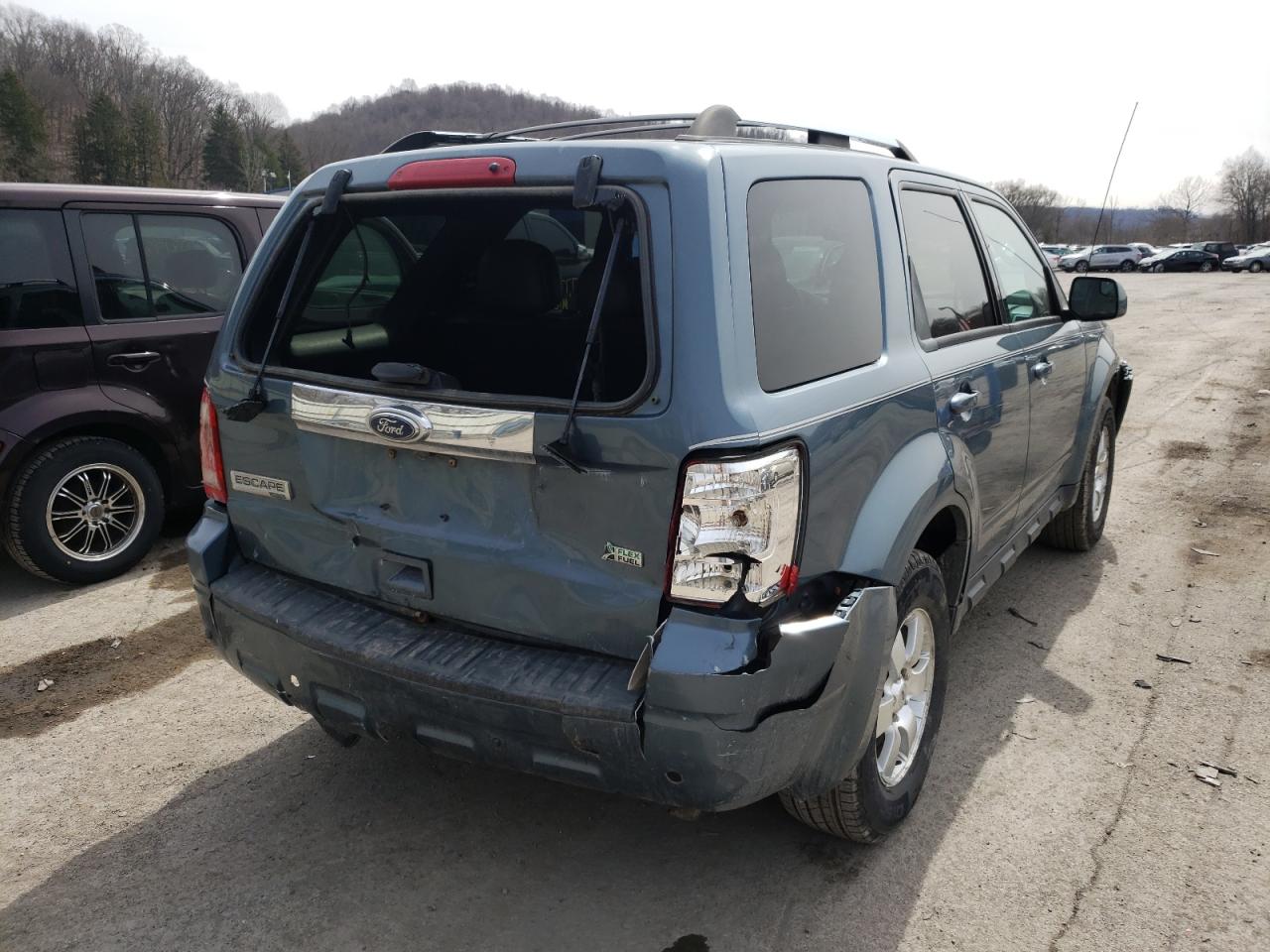Photo 4 from auction – 2011 FORD ESCAPE LIM with VIN 1FMCU9EG1BKB83102