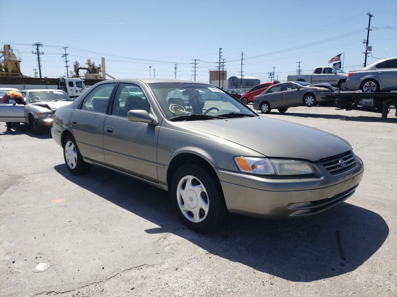 TOYOTA CAMRY CE 1998 with VIN JT2BF22K7W0143921 - Photo from auction
