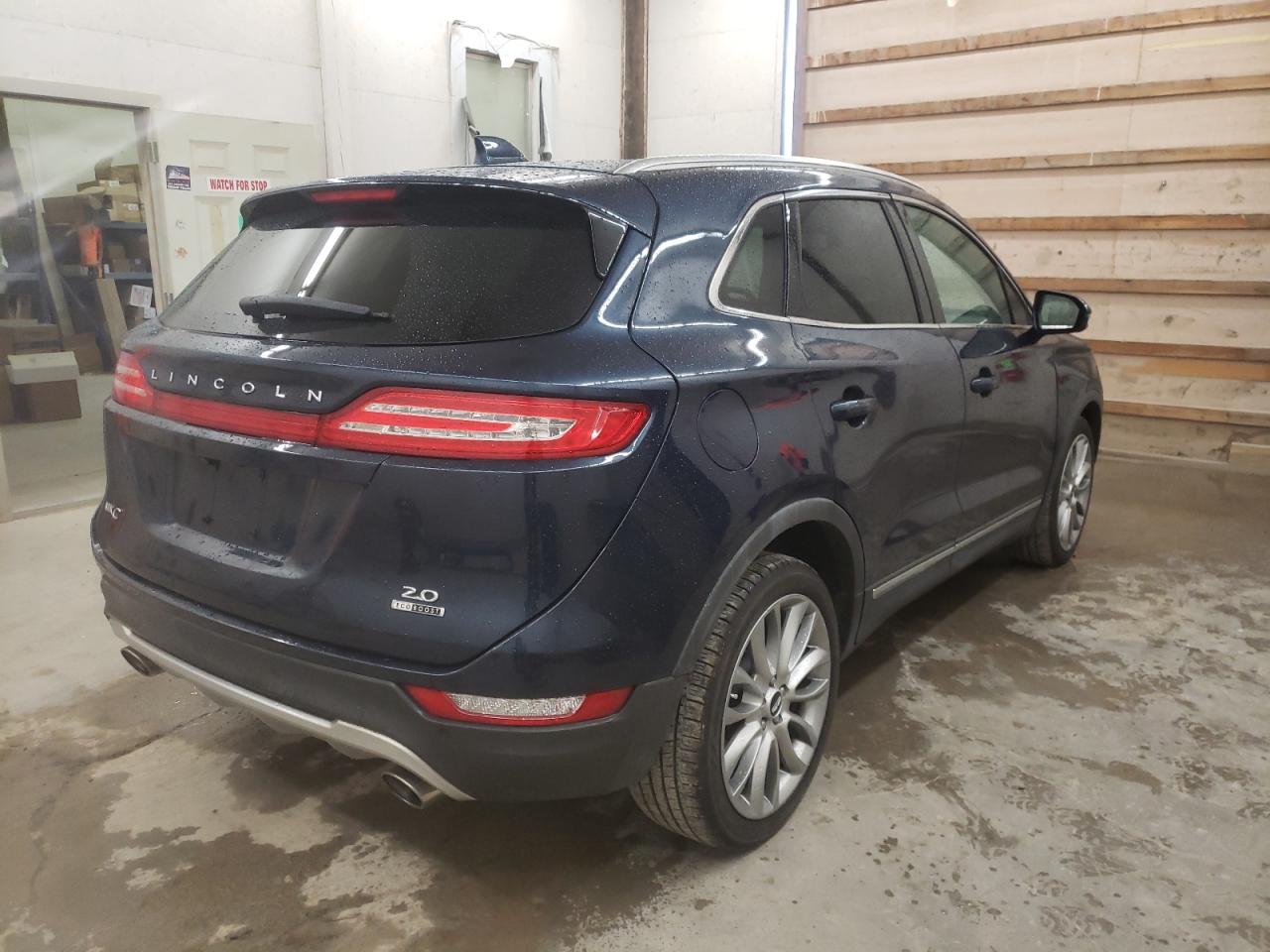 Photo 4 from auction – 2015 LINCOLN MKC with VIN 5LMCJ1A93FUJ33052