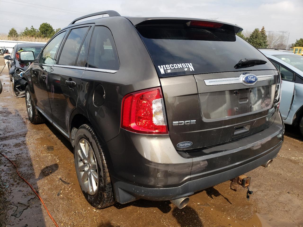 Photo 3 from auction – 2011 FORD EDGE LIMIT with VIN 2FMDK4KC9BBA01641
