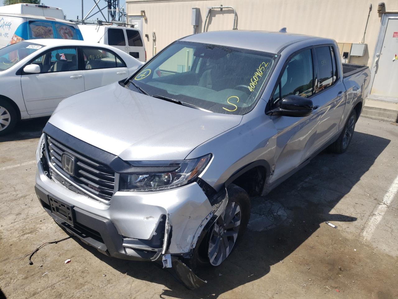 Photo 2 from auction – 2022 HONDA RIDGELINE with VIN 5FPYK3F10NB007058