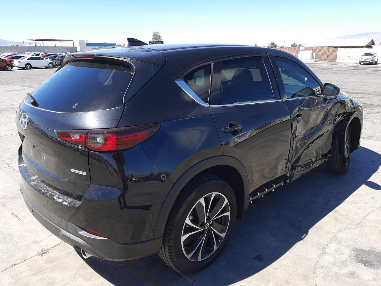 Photo 4 from auction – 2022 MAZDA CX-5 with VIN JM3KFBEM6N1546308