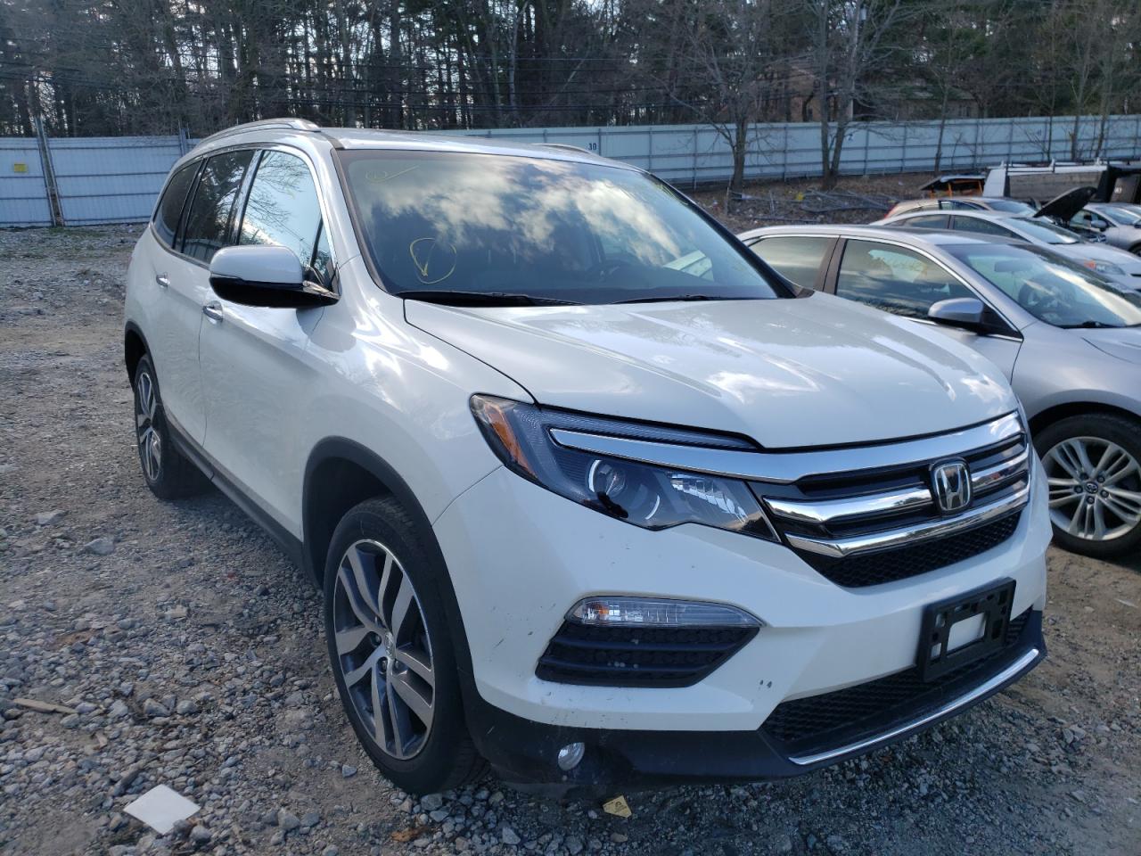 Photo 1 from auction – 2018 HONDA PILOT ELIT with VIN 5FNYF6H04JB041436