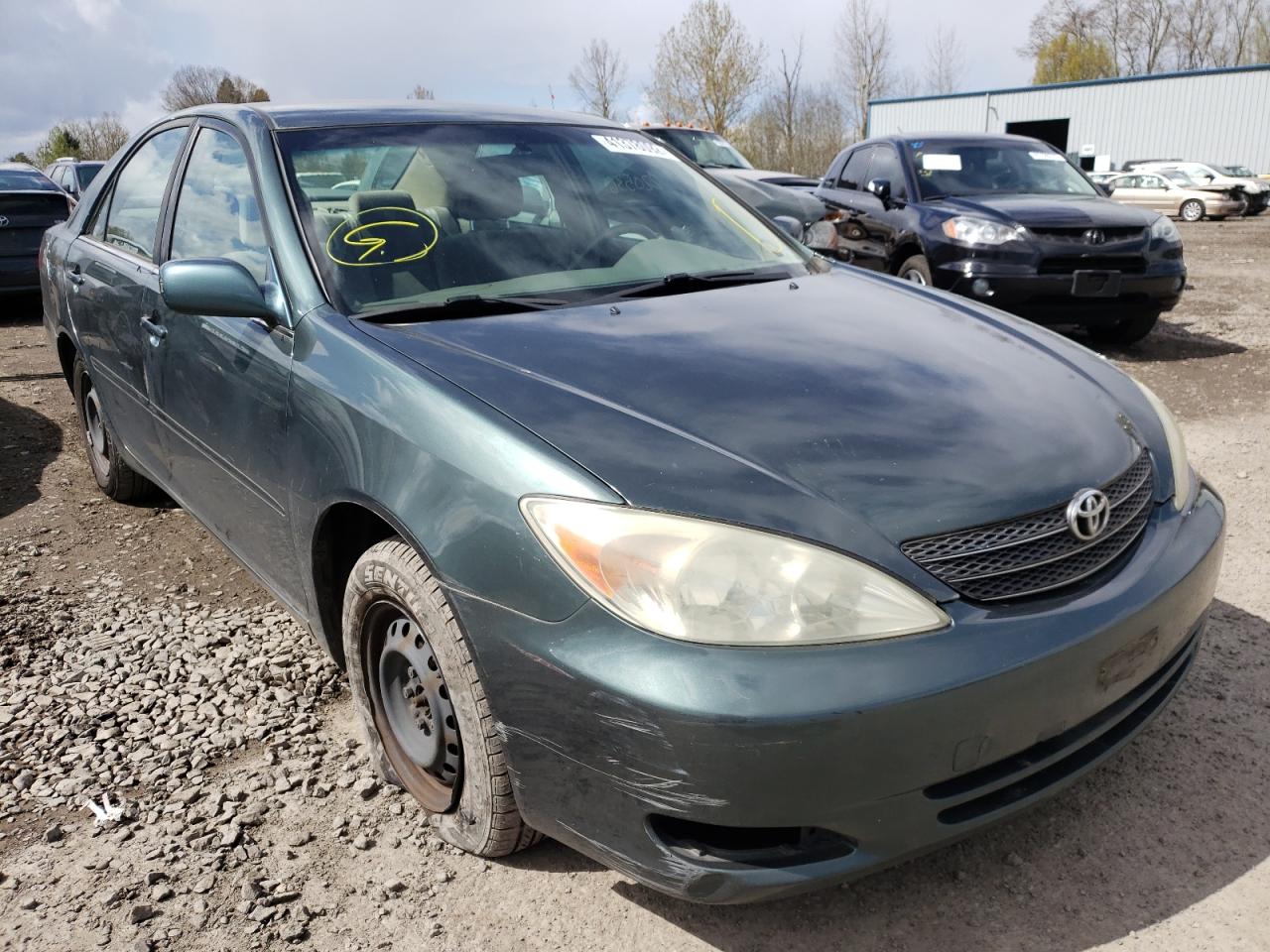 Photo 1 from auction – 2003 TOYOTA CAMRY LE with VIN JTDBE32K230174215