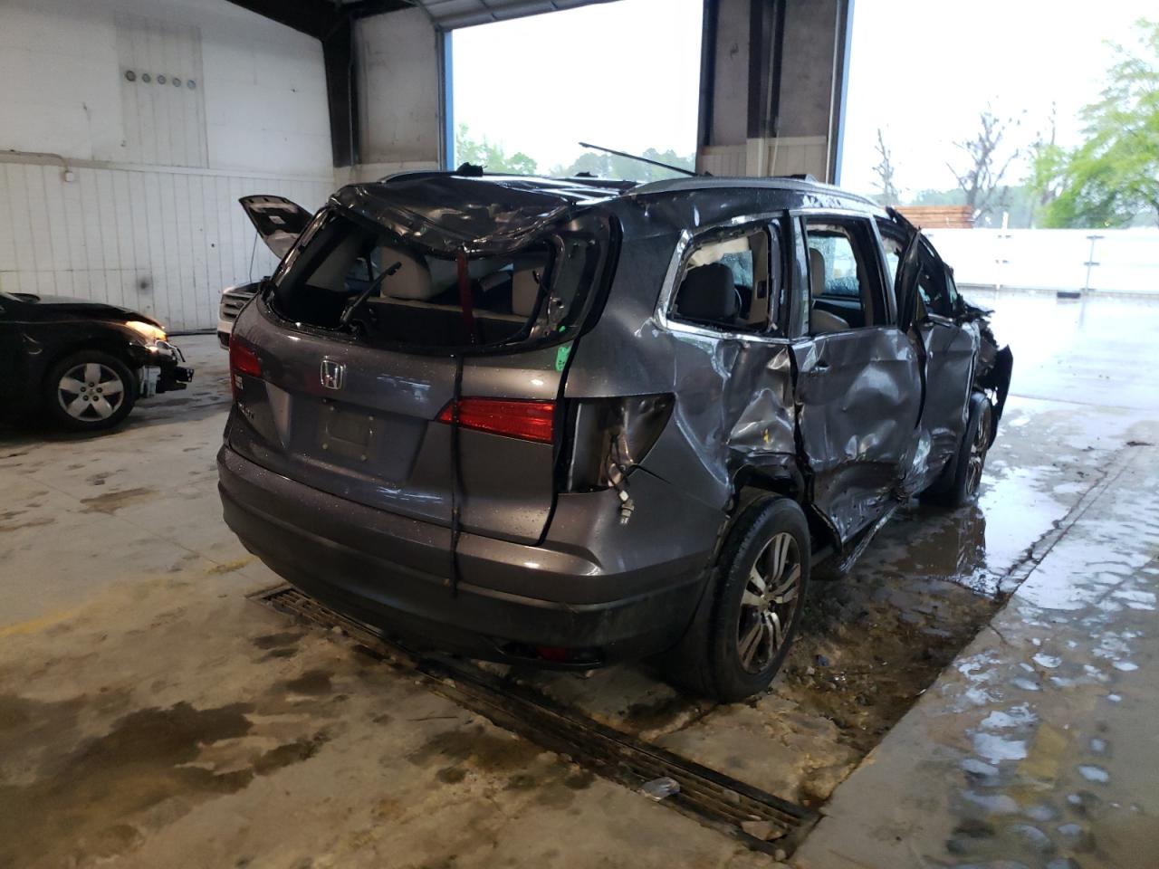 Photo 4 from auction – 2016 HONDA PILOT EXL with VIN 5FNYF5H52GB017389