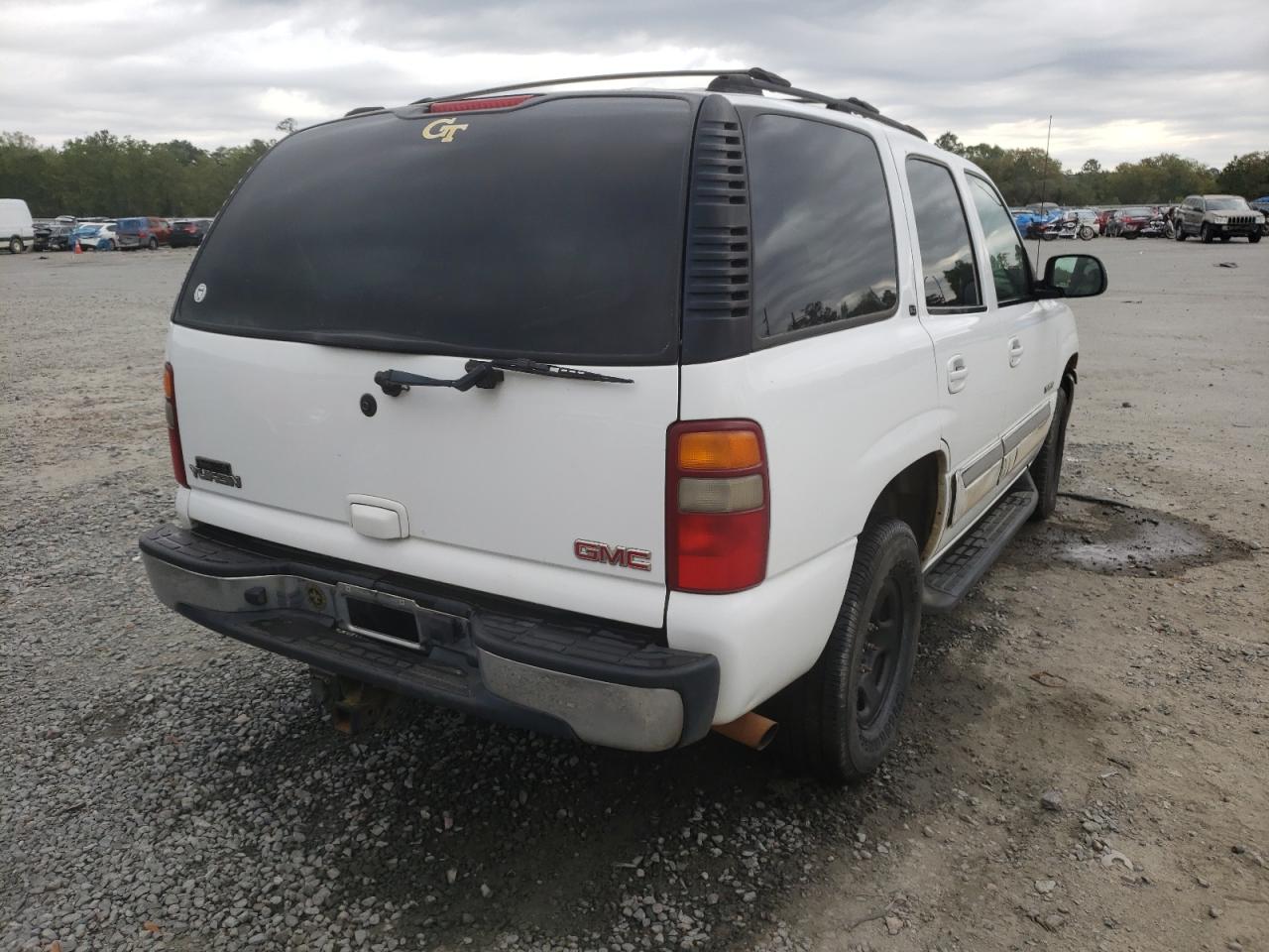 Photo 4 from auction – 2003 GMC YUKON with VIN 1GKEC13Z73R245864