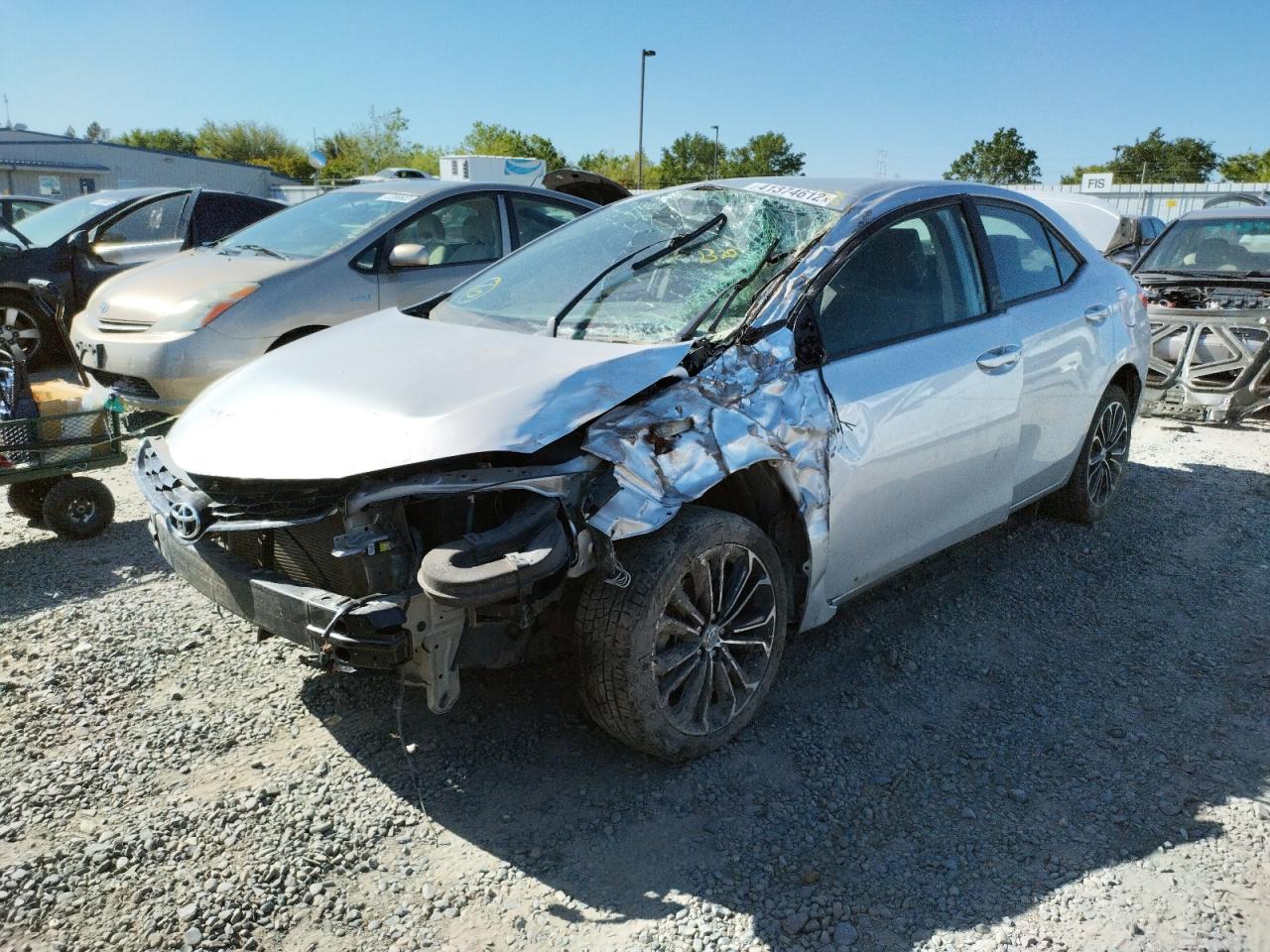 Photo 2 from auction – 2015 TOYOTA COROLLA L with VIN 5YFBURHE8FP237450