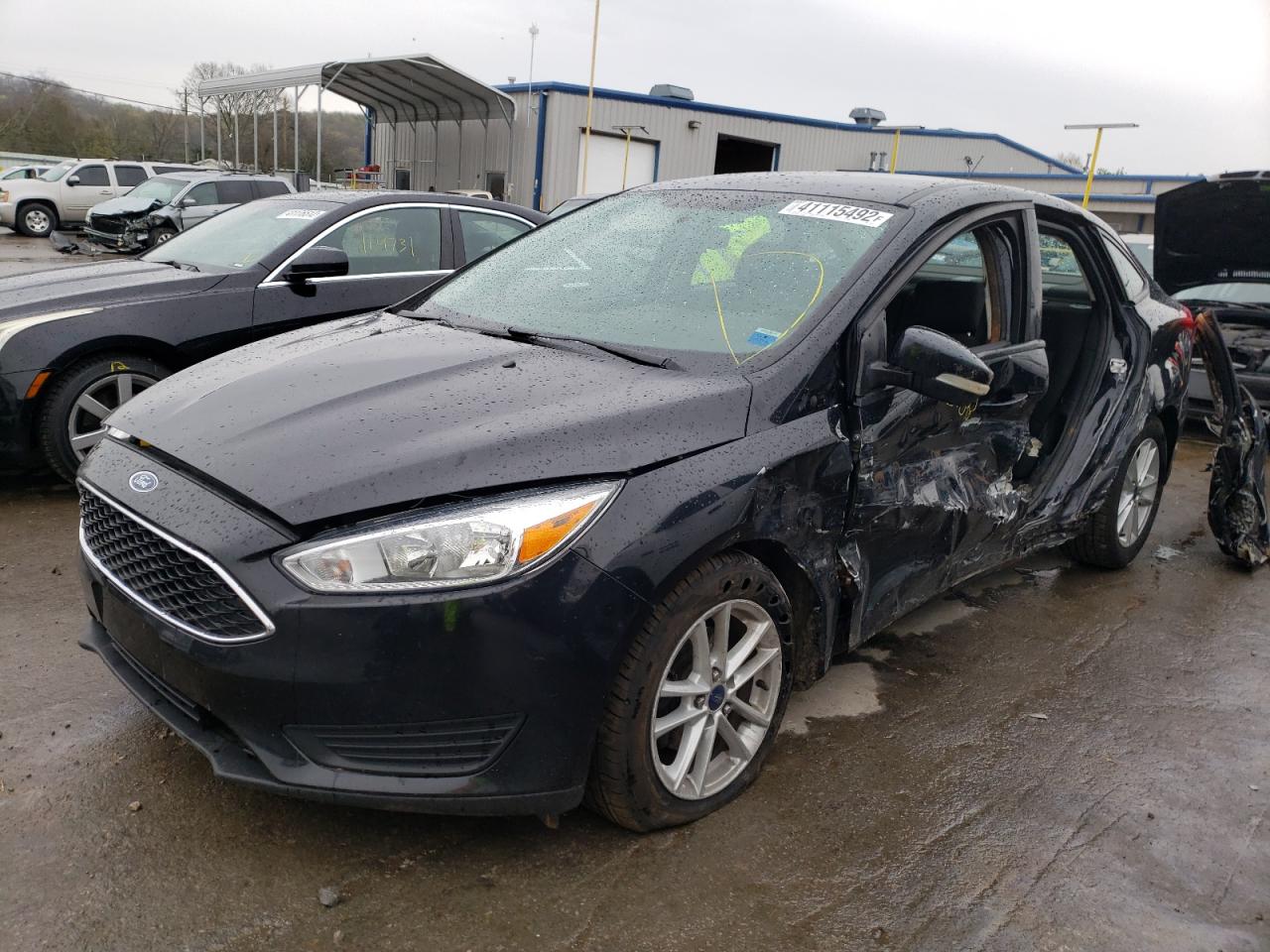 Photo 2 from auction – 2015 FORD FOCUS SE with VIN 1FADP3F26FL373418