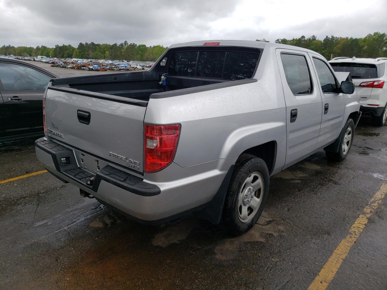 Photo 4 from auction – 2010 HONDA RIDGELINE with VIN 5FPYK1F26AB006374