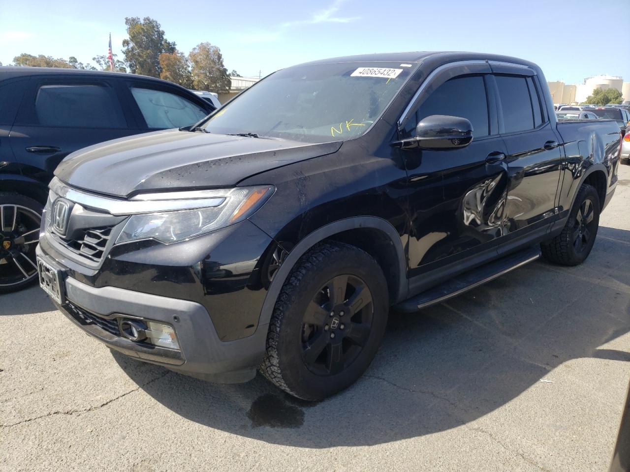Photo 2 from auction – 2017 HONDA RIDGELINE with VIN 5FPYK3F85HB035911