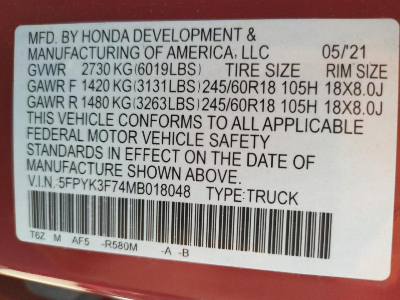 Photo 10 from auction – 2021 HONDA RIDGELINE with VIN 5FPYK3F74MB018048
