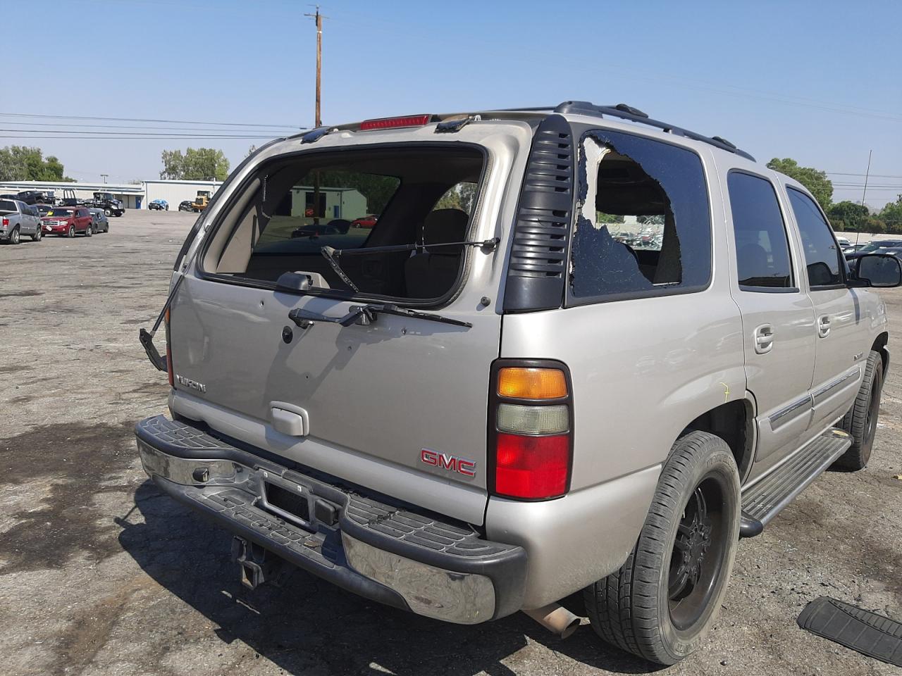 Photo 9 from auction – 2005 GMC YUKON with VIN 1GKEC13V05R252056