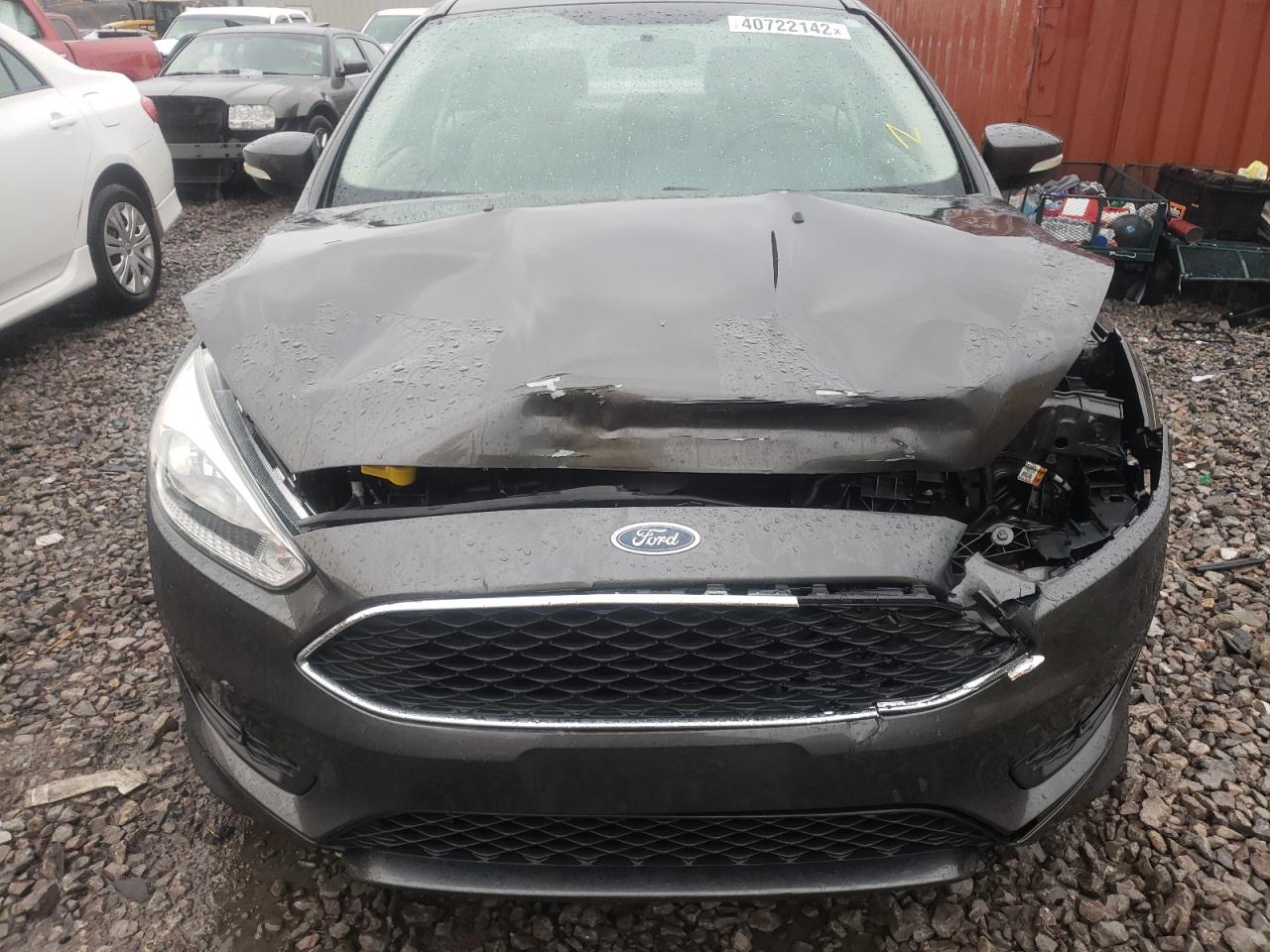 Photo 7 from auction – 2015 FORD FOCUS SE with VIN 1FADP3F2XFL304165