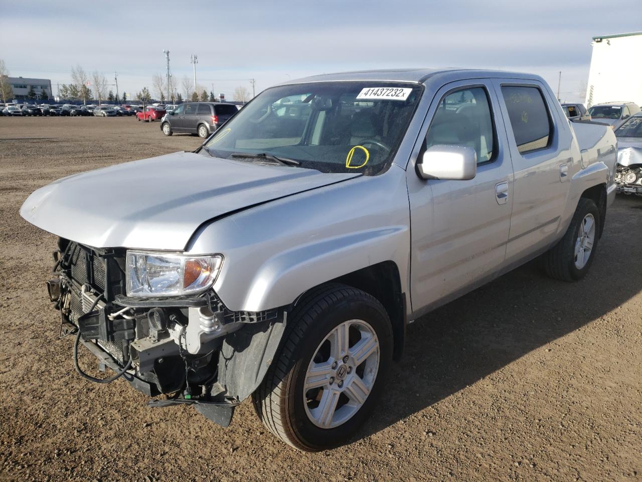 Photo 2 from auction – 2013 HONDA RIDGELINE with VIN 5FPYK1F59DB501926