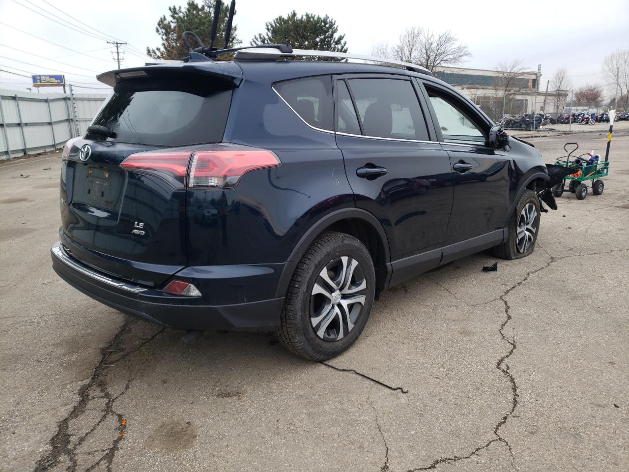 Photo 4 from auction – 2018 TOYOTA RAV4 LE with VIN JTMBFREV1JJ249631