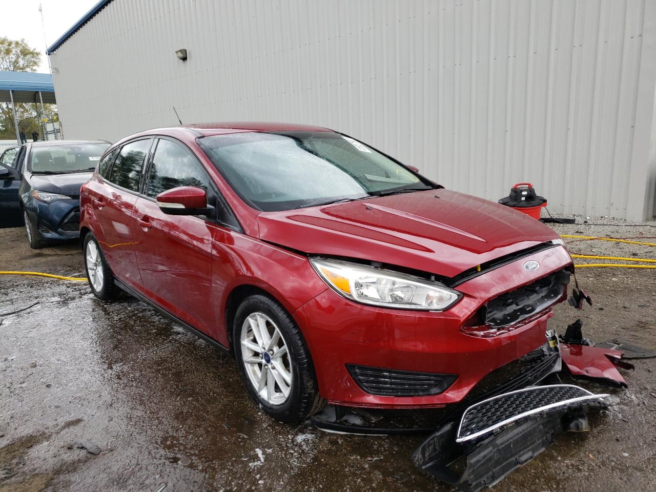 FORD FOCUS SE 2015 with VIN 1FADP3K2XFL381673 - Photo from auction