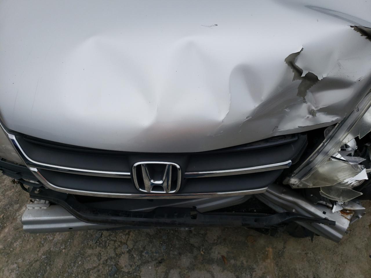 Photo 7 from auction – 2011 HONDA CR-V LX with VIN JHLRE3H35BC002744