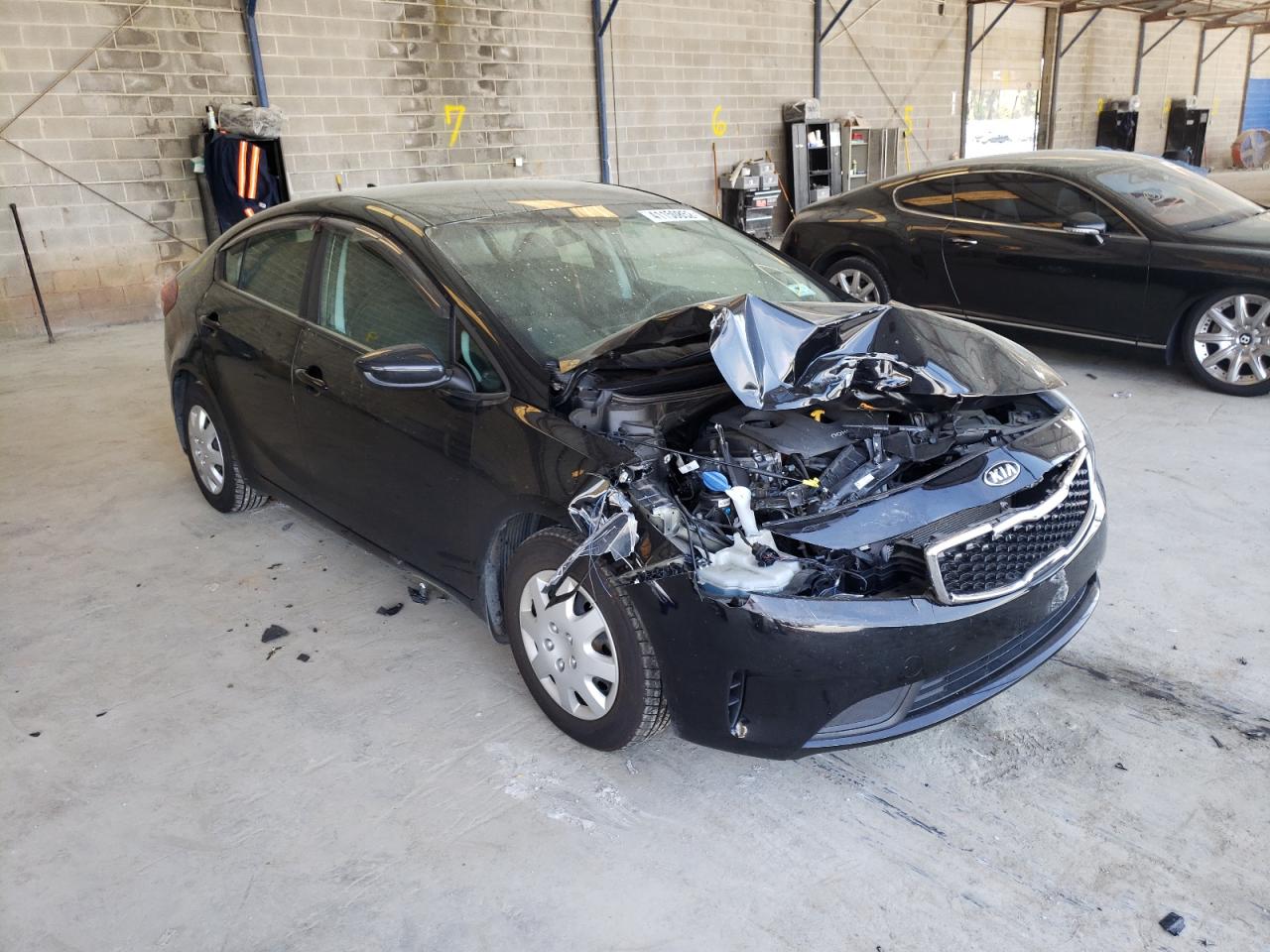 KIA FORTE LX 2017 with VIN 3KPFK4A74HE033514 - Photo from auction