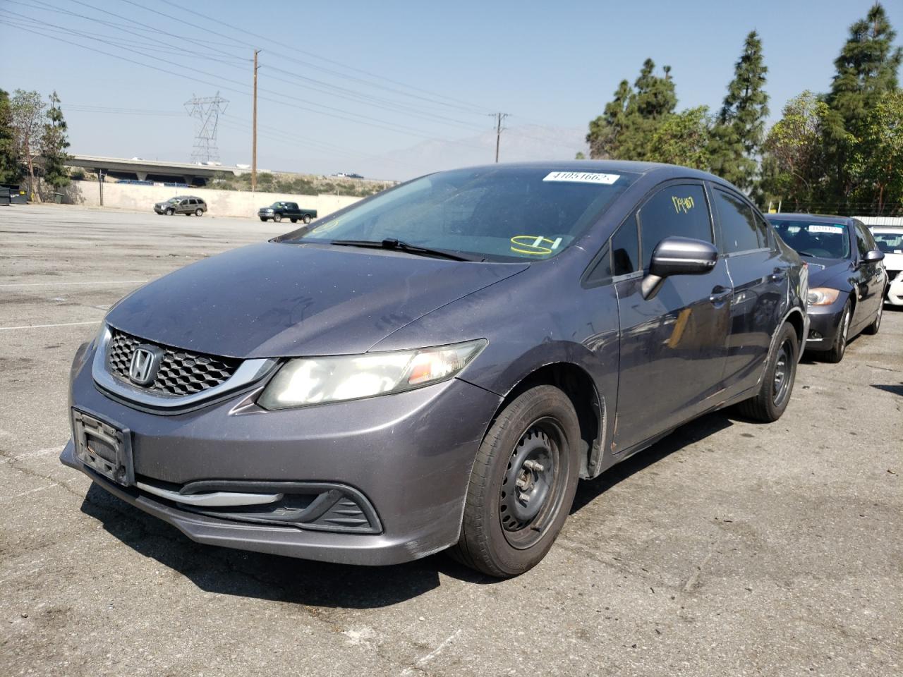 Photo 2 from auction – 2014 HONDA CIVIC LX with VIN 19XFB2F53EE270826