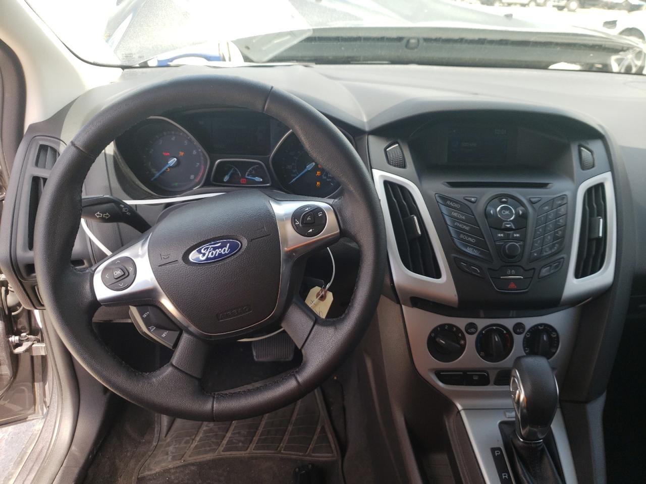 Photo 9 from auction – 2014 FORD FOCUS SE with VIN 1FADP3F24EL339279