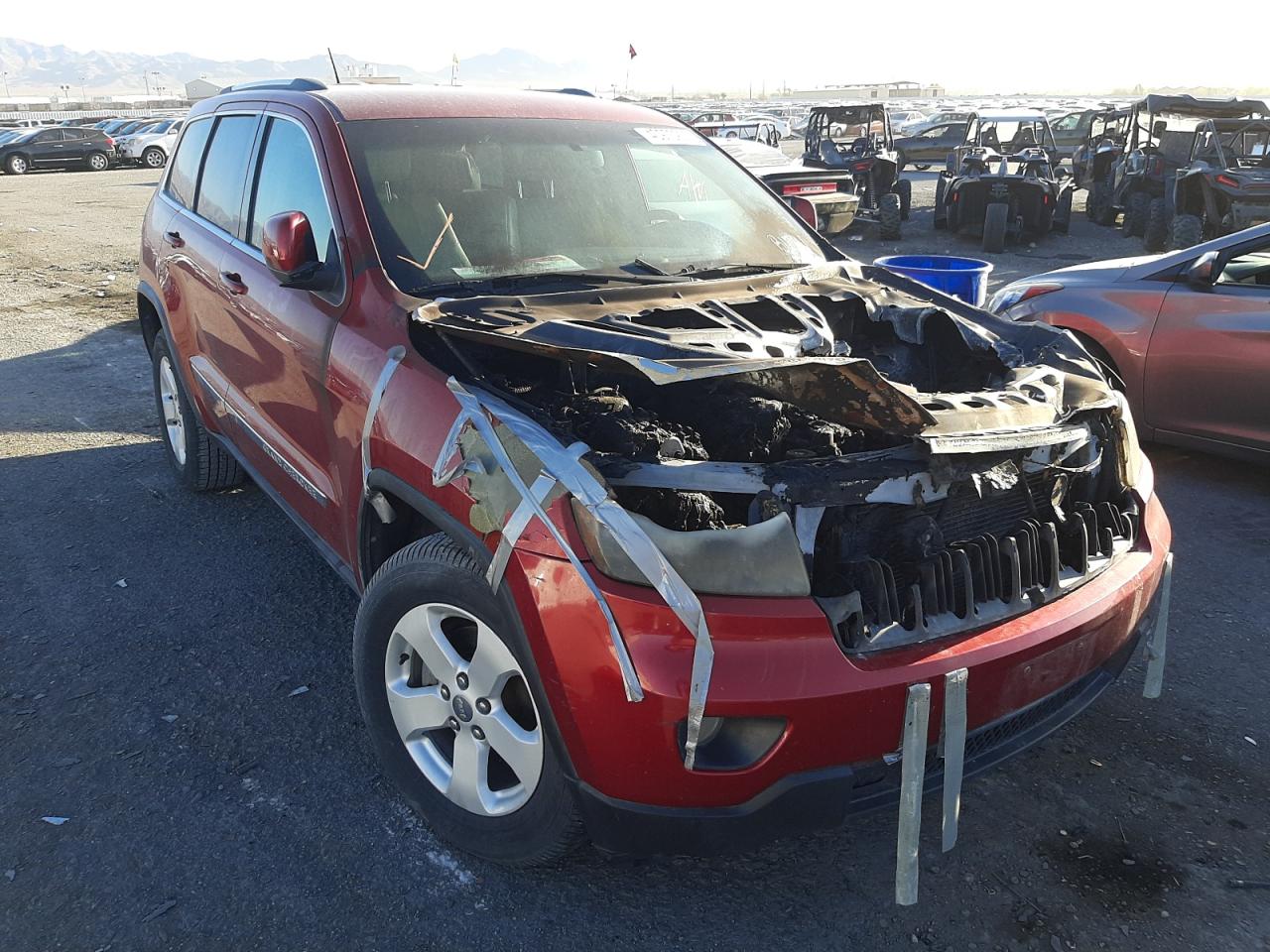 JEEP GRAND CHER 2011 with VIN 1J4RR4GG3BC525900 - Photo from auction