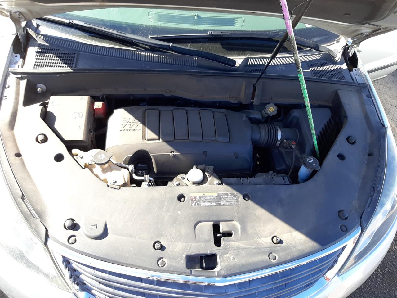 Photo 7 from auction – 2013 CHEVROLET TRAVERSE L with VIN 1GNKRFED0DJ129330