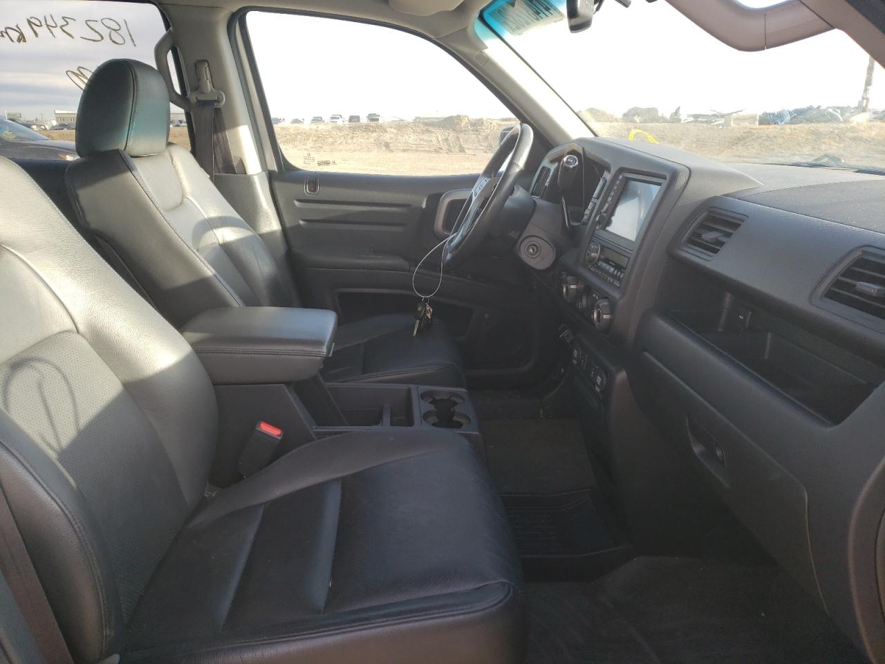 Photo 5 from auction – 2013 HONDA RIDGELINE with VIN 5FPYK1F59DB501926