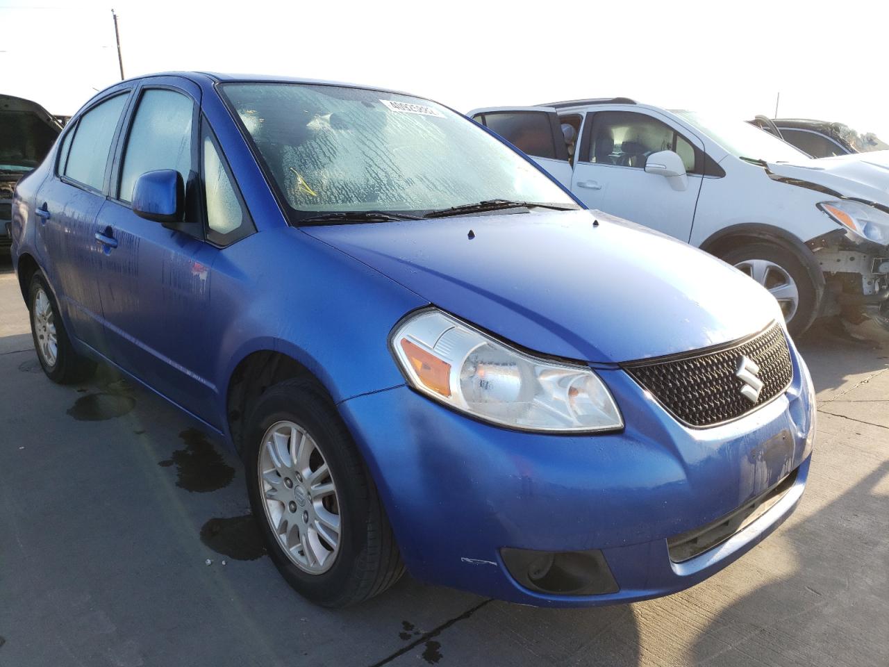 SUZUKI SX4 LE 2012 with VIN JS2YC5A3XC6302872 - Photo from auction