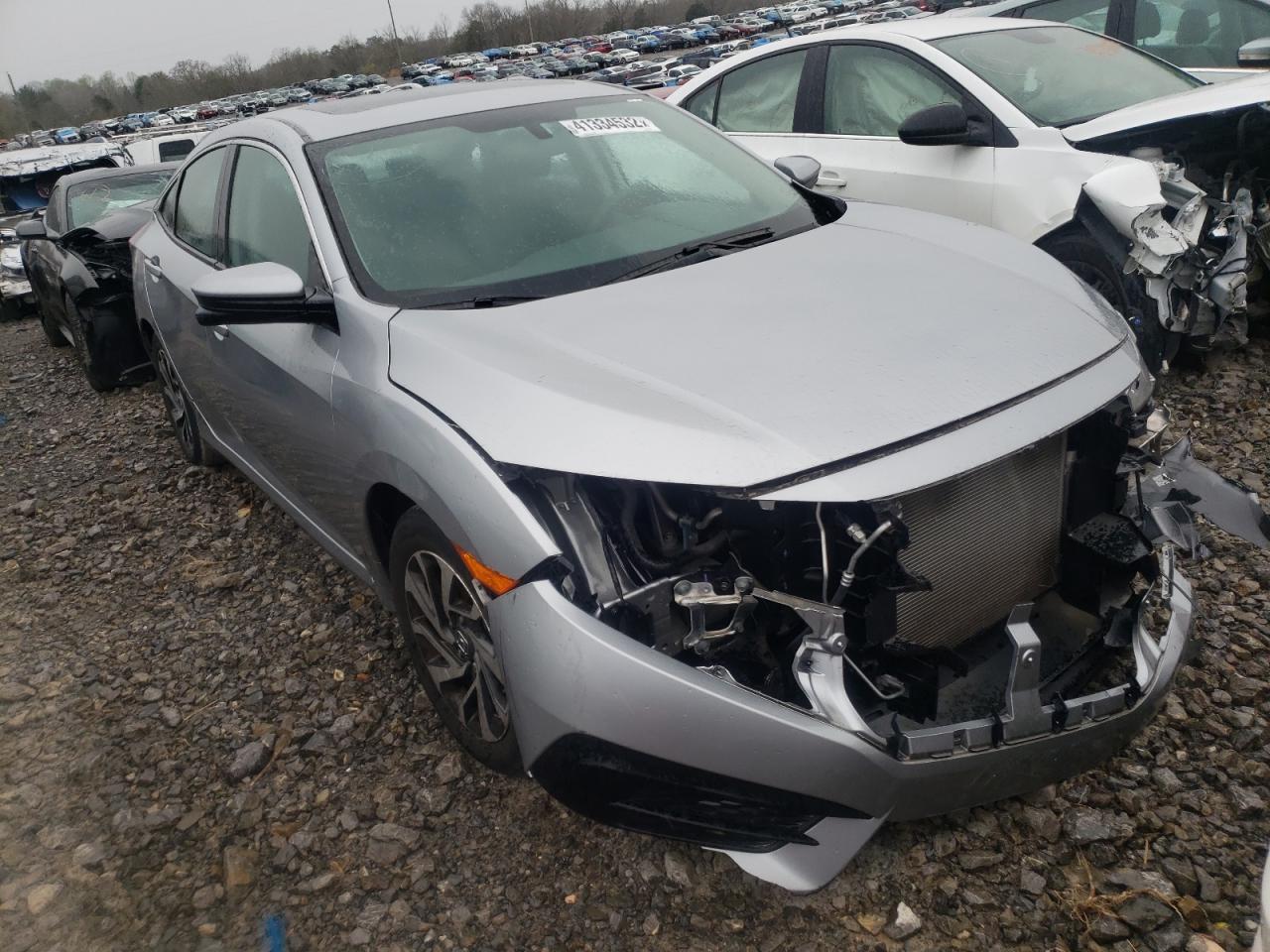 HONDA CIVIC EX 2018 with VIN 19XFC2F75JE041279 - Photo from auction