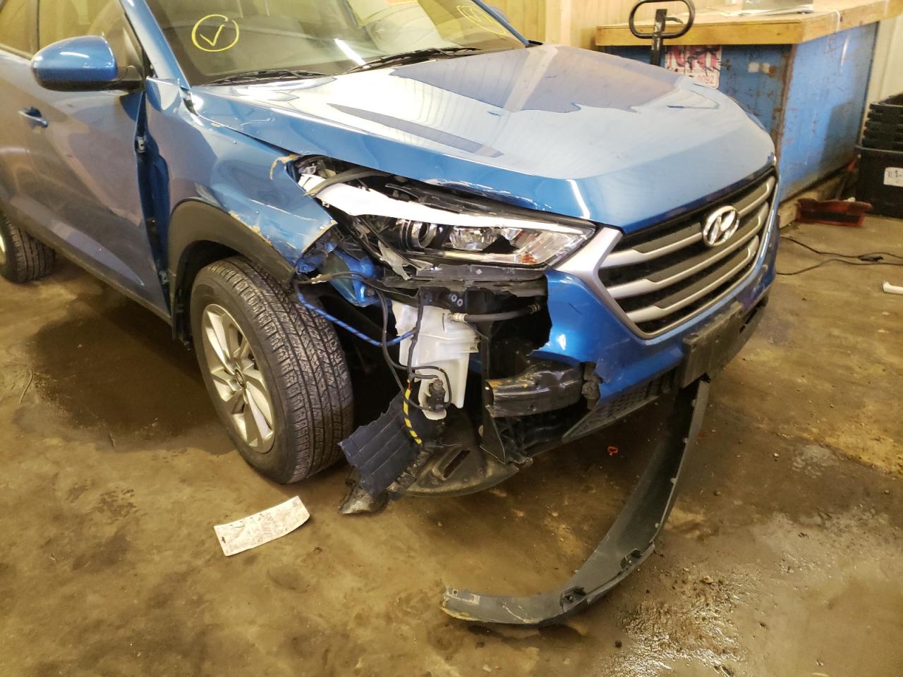 Photo 9 from auction – 2018 HYUNDAI TUCSON SE with VIN KM8J2CA45JU777023