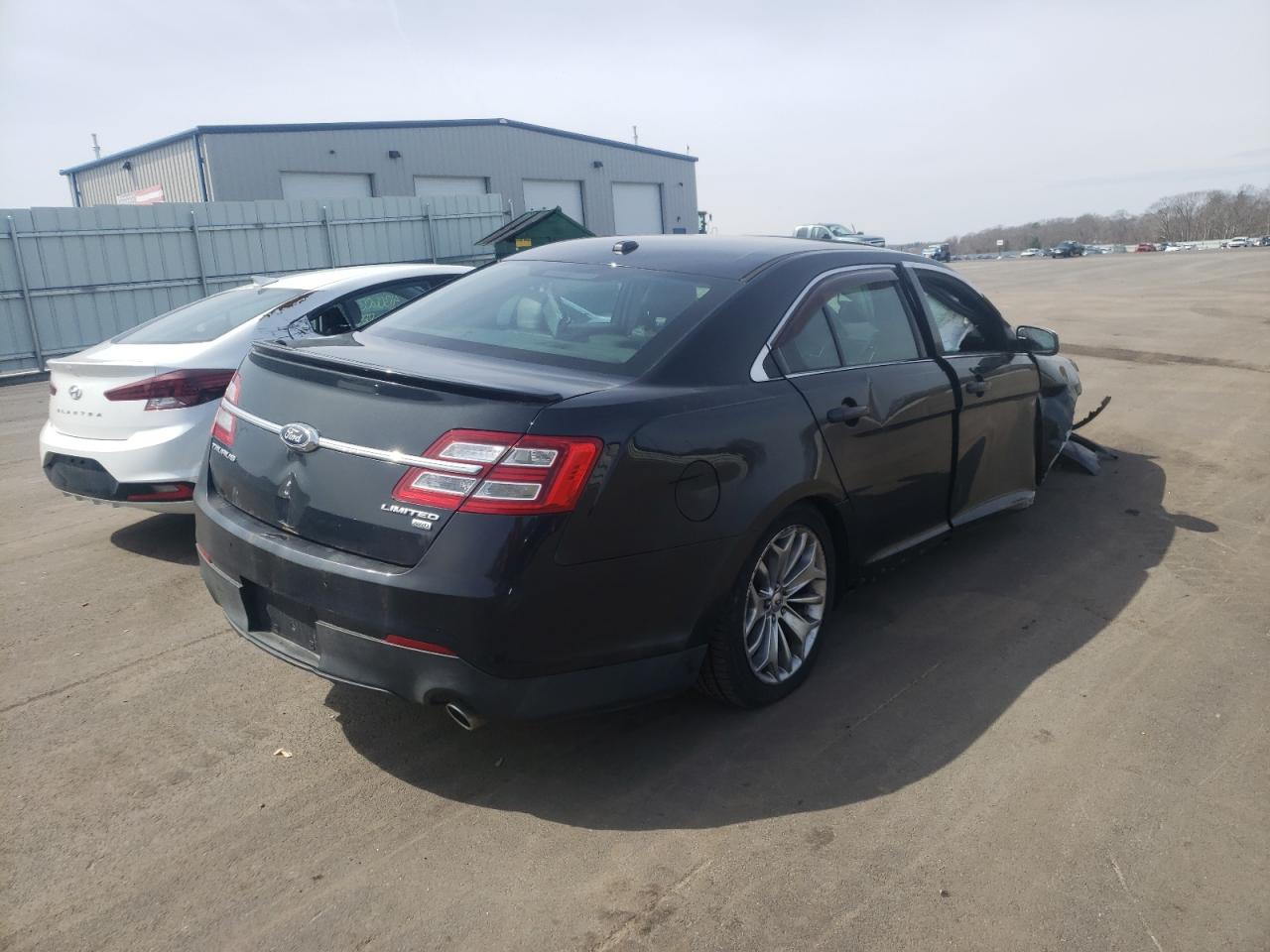 Photo 4 from auction – 2013 FORD TAURUS LIM with VIN 1FAHP2J84DG165566