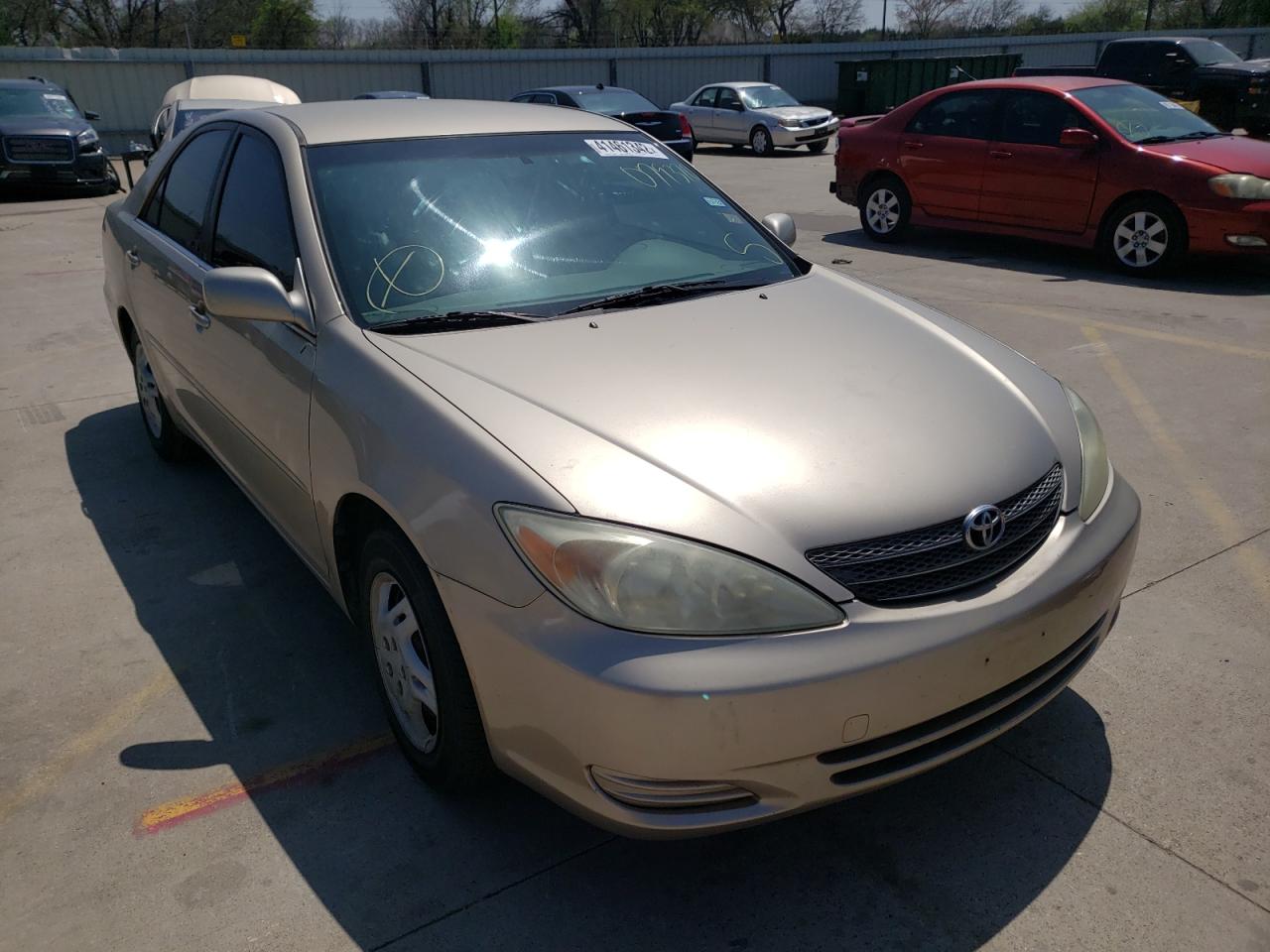 Photo 1 from auction – 2002 TOYOTA CAMRY LE with VIN JTDBE32K120079370
