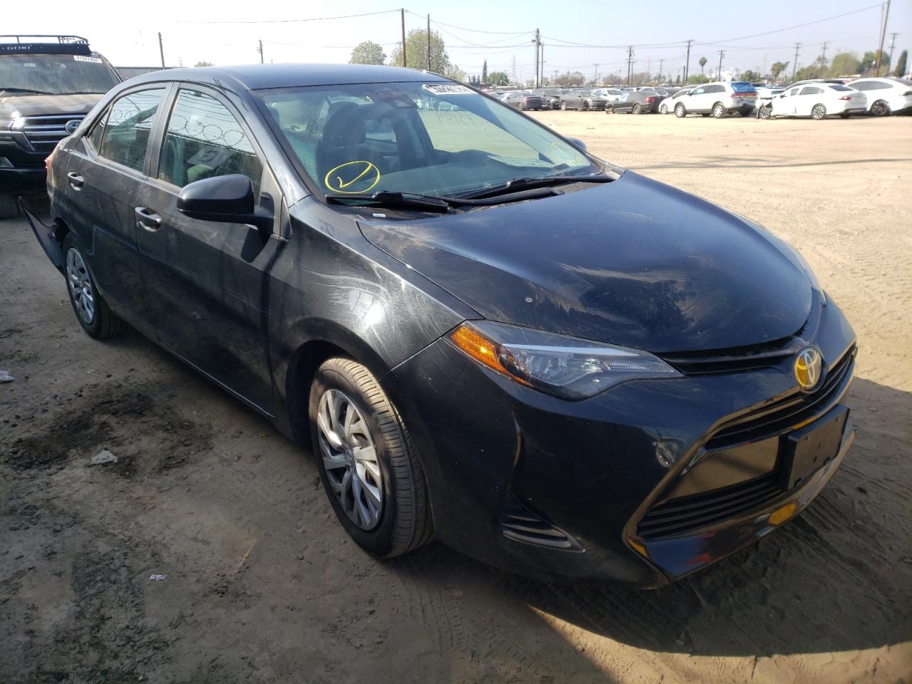 TOYOTA COROLLA L 2019 with VIN 5YFBURHE1KP897100 - Photo from auction