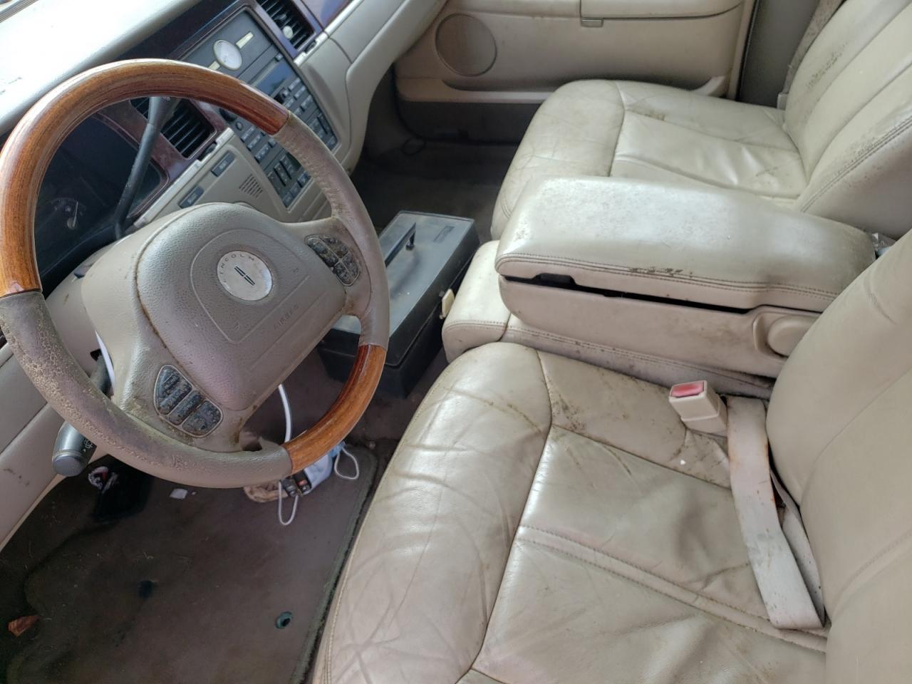 Photo 9 from auction – 2004 LINCOLN TOWN CAR U with VIN 1LNHM83W34Y674863