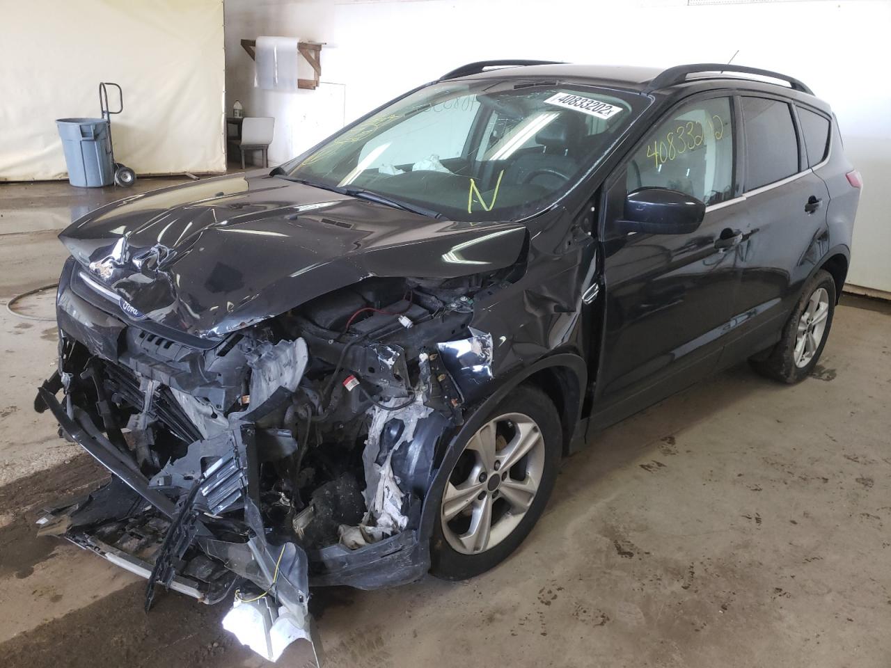 Photo 2 from auction – 2014 FORD ESCAPE SE with VIN 1FMCU0GX0EUD64614
